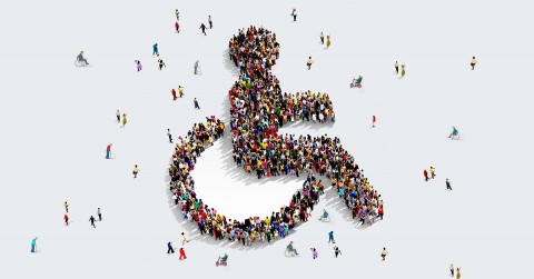 many people coming together to make the symbol of accessibility