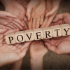 Disability Poverty Stats in Canada Many hands holding blocks that spell out the word poverty